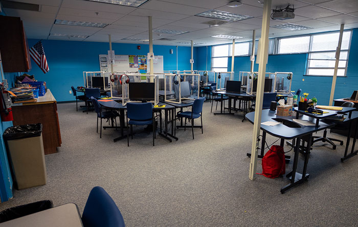 Photo of classroom full of computers for students to use.